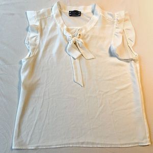 Beautiful, White, Chopin tank top with ruffled capped sleeves and a neck tie.